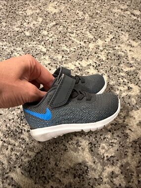 Nike Kids Gray Sneakers with Blue Swoosh